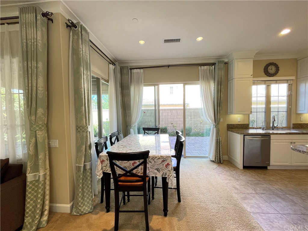 71 Thornapple Irvine, CA 92620 - Photo 12 of 18 a dining room with furniture and window
