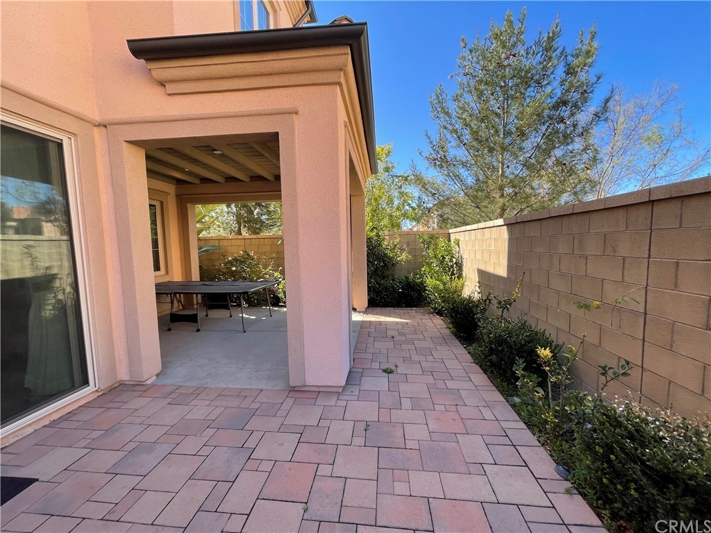 71 Thornapple Irvine, CA 92620 - Photo 15 of 18 a view of a house with a backyard