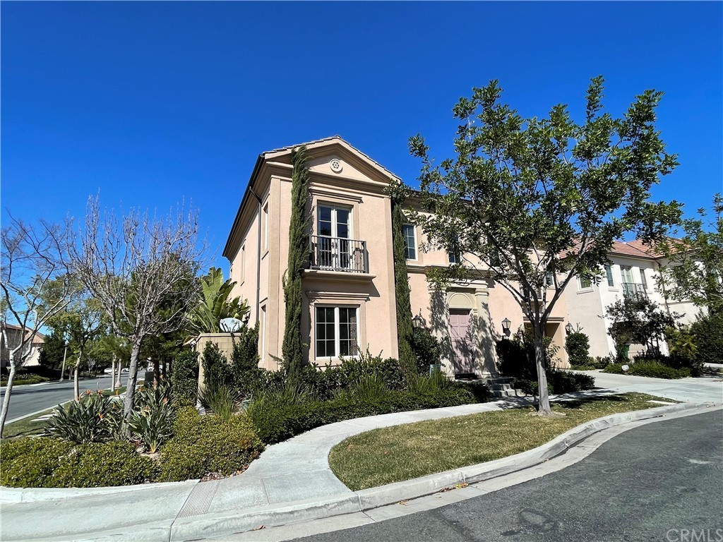 71 Thornapple Irvine, CA 92620 - Photo 18 of 18 a front view of a house with a yard