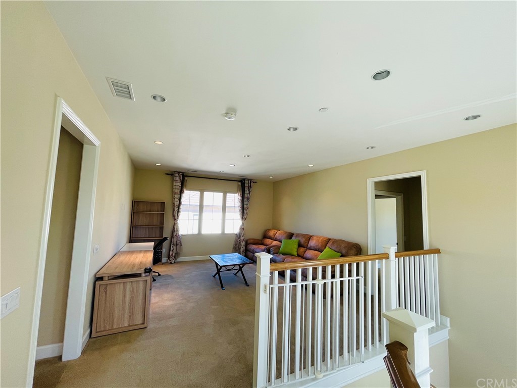 71 Thornapple Irvine, CA 92620 - Photo 3 of 18 a living room with furniture and a window