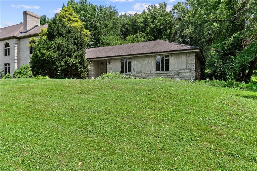 1060 Fox Chapel Road Pittsburgh, PA 15238 - Photo 49 of 50 This a view of the original ranch structure with features a 2 car side entry integral garage.