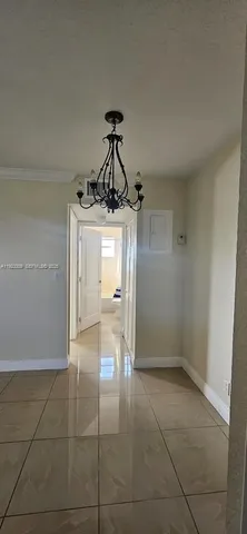 a view of a livingroom with a chandelier