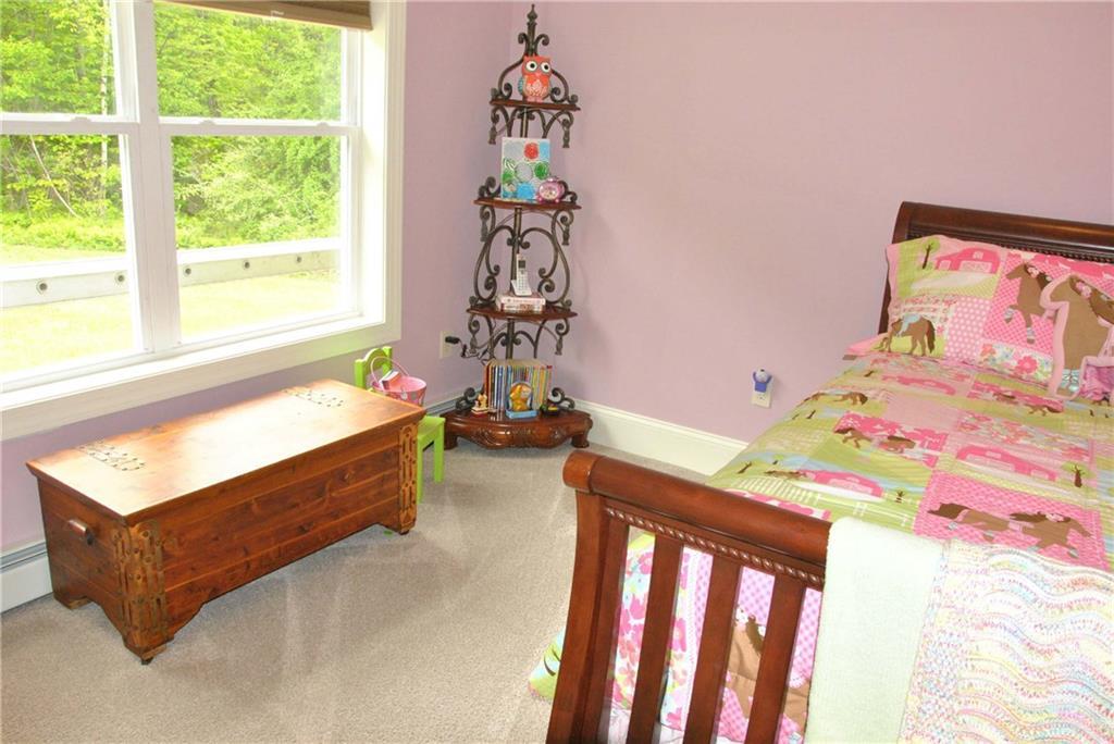 540 Zions Hill Road Chesterville, ME 04938 - Photo 22 of 31 Second/guest bedroom with luxury...