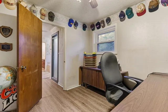 a view of livingroom with furniture and hallway