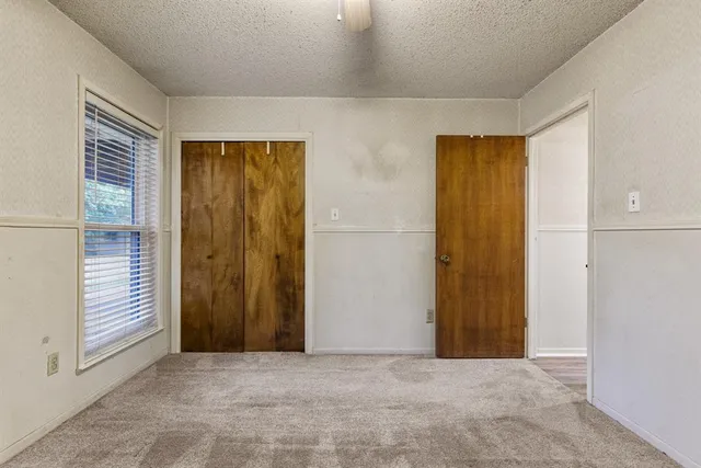 an empty room with closet