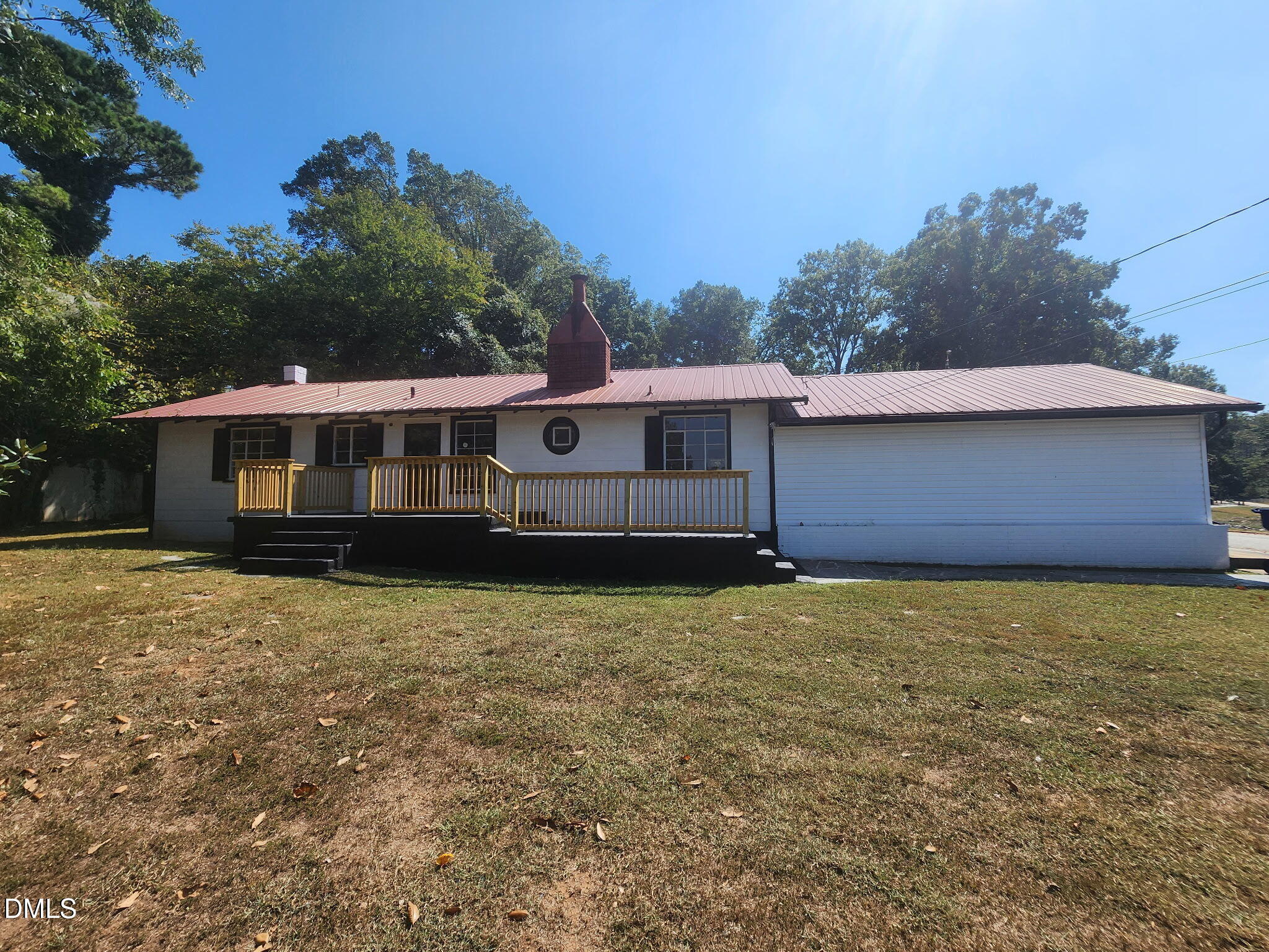 519 West Raleigh Street Siler City, NC 27344 - Photo 2 of 47 a backyard of a house