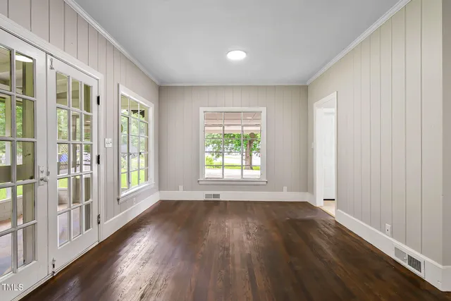 a view of a livingroom with wooden floor