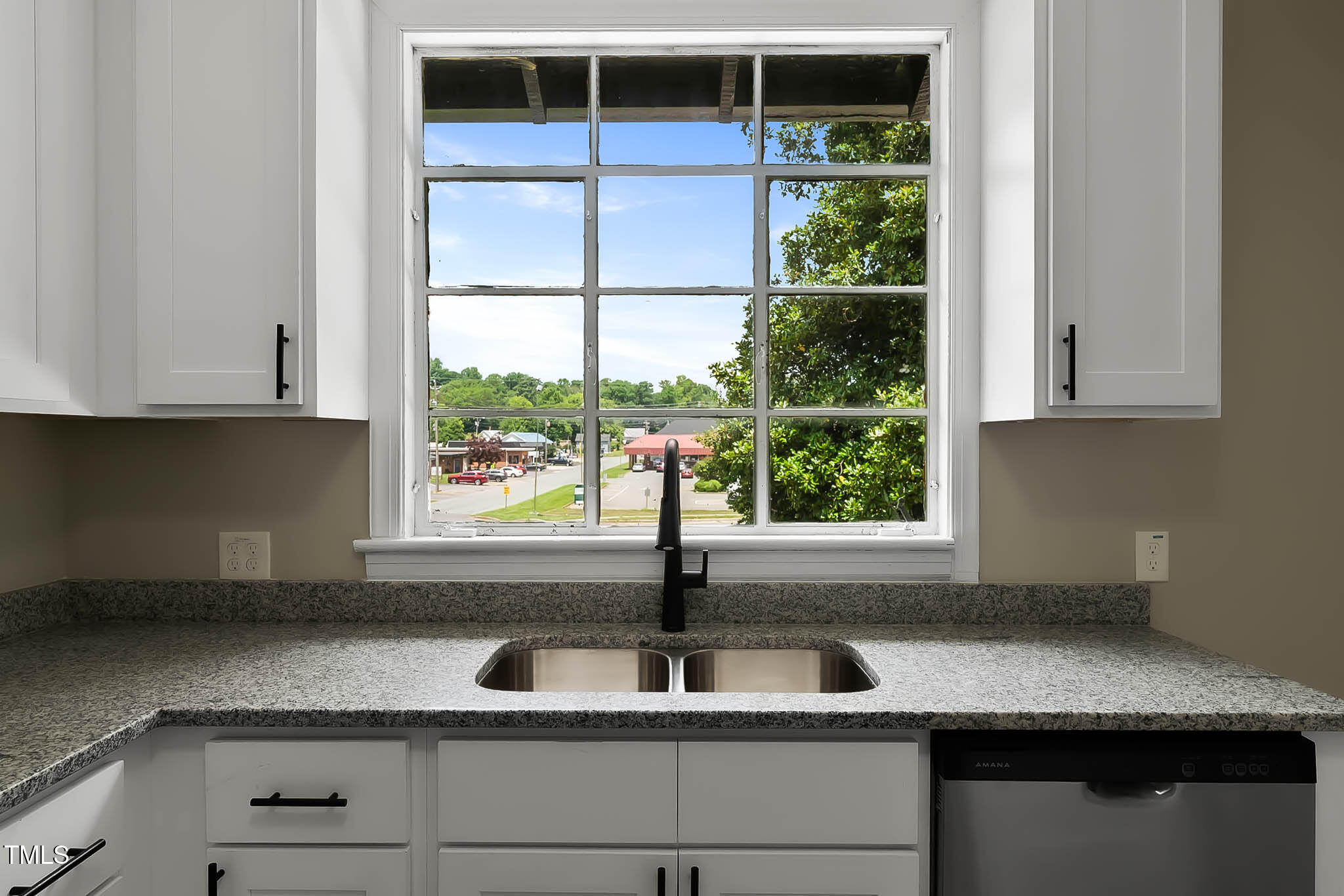 519 West Raleigh Street Siler City, NC 27344 - Photo 44 of 47 a kitchen with a sink and window