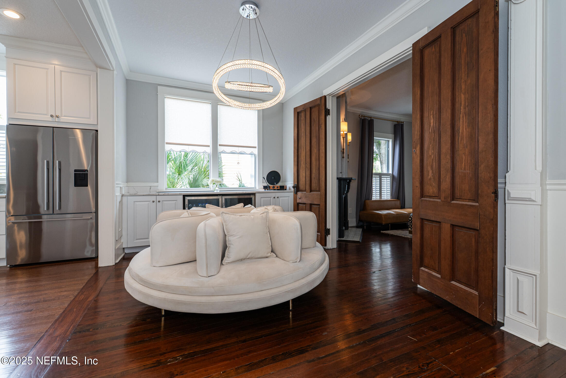 56 Water Street St. Augustine, FL 32084 - Photo 17 of 61 a living room with furniture and a large window