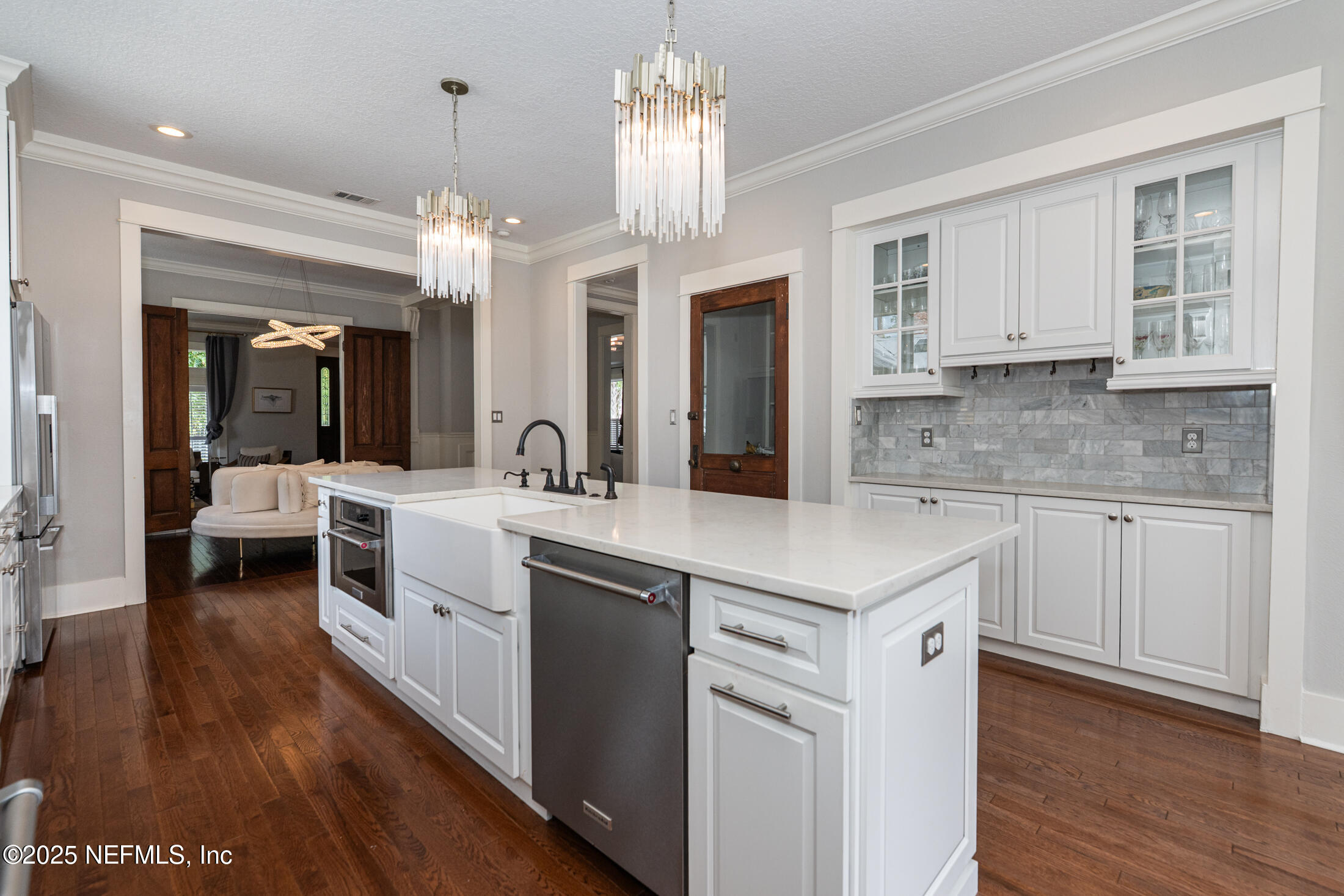 56 Water Street St. Augustine, FL 32084 - Photo 23 of 61 a kitchen with a center island appliances and cabinets
