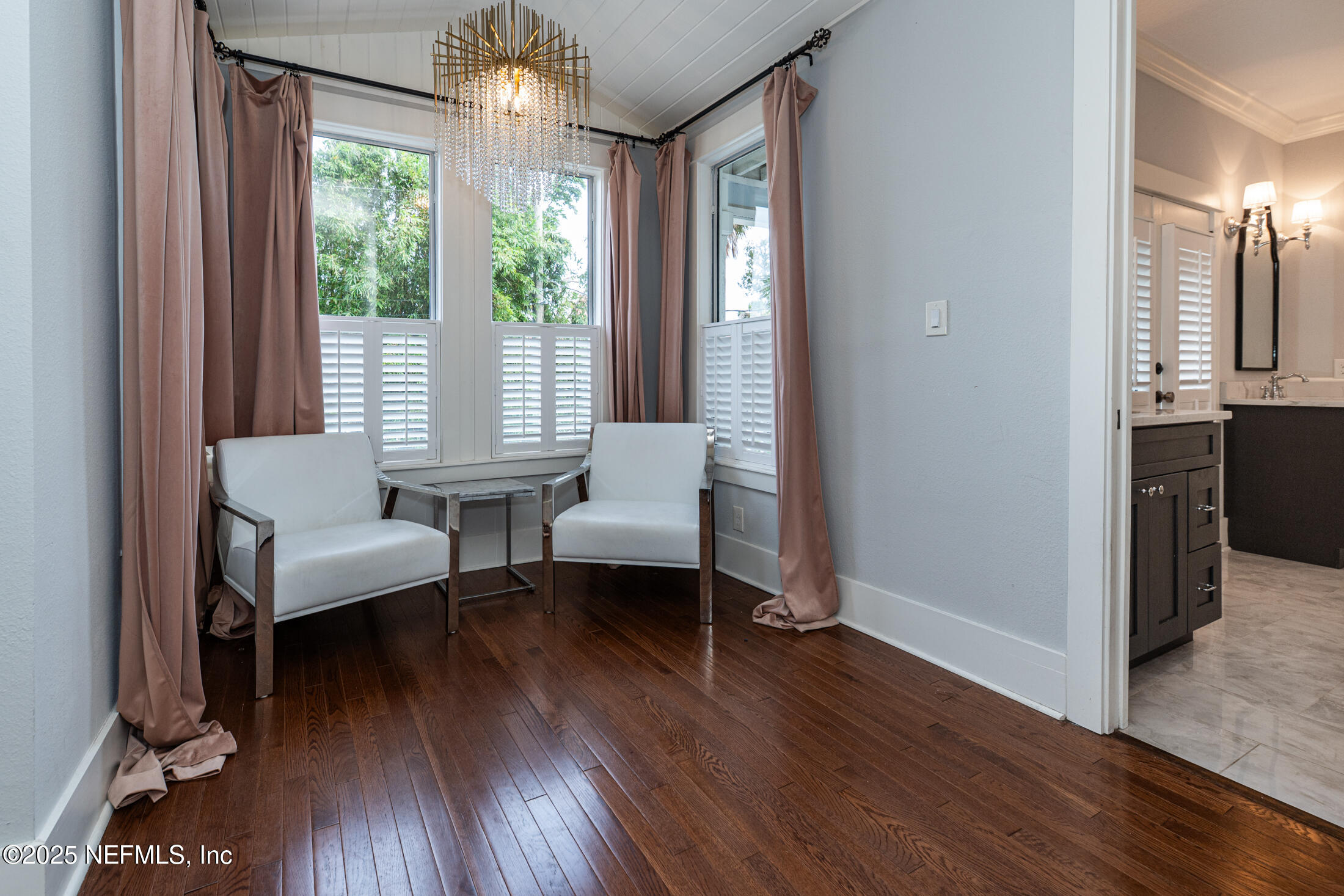 56 Water Street St. Augustine, FL 32084 - Photo 37 of 61 a living room with furniture and a large window