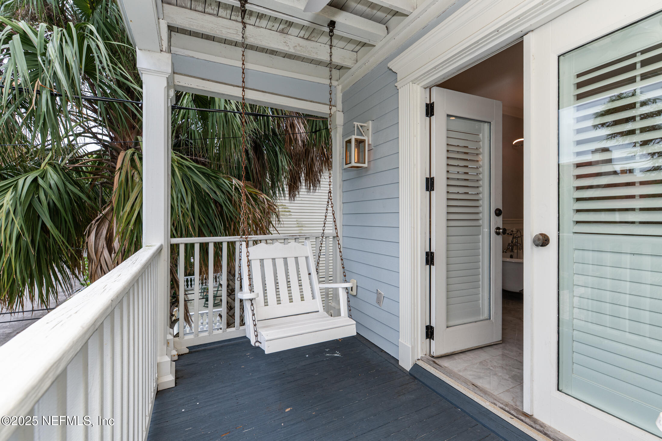 56 Water Street St. Augustine, FL 32084 - Photo 40 of 61 a view of a porch with a door and a porch