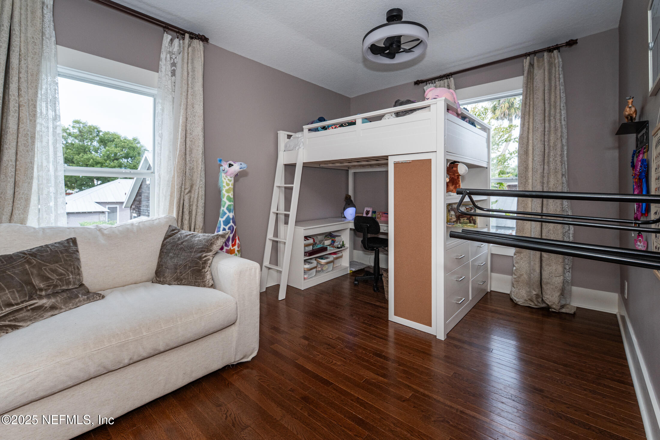 56 Water Street St. Augustine, FL 32084 - Photo 50 of 61 a living room with furniture and a window