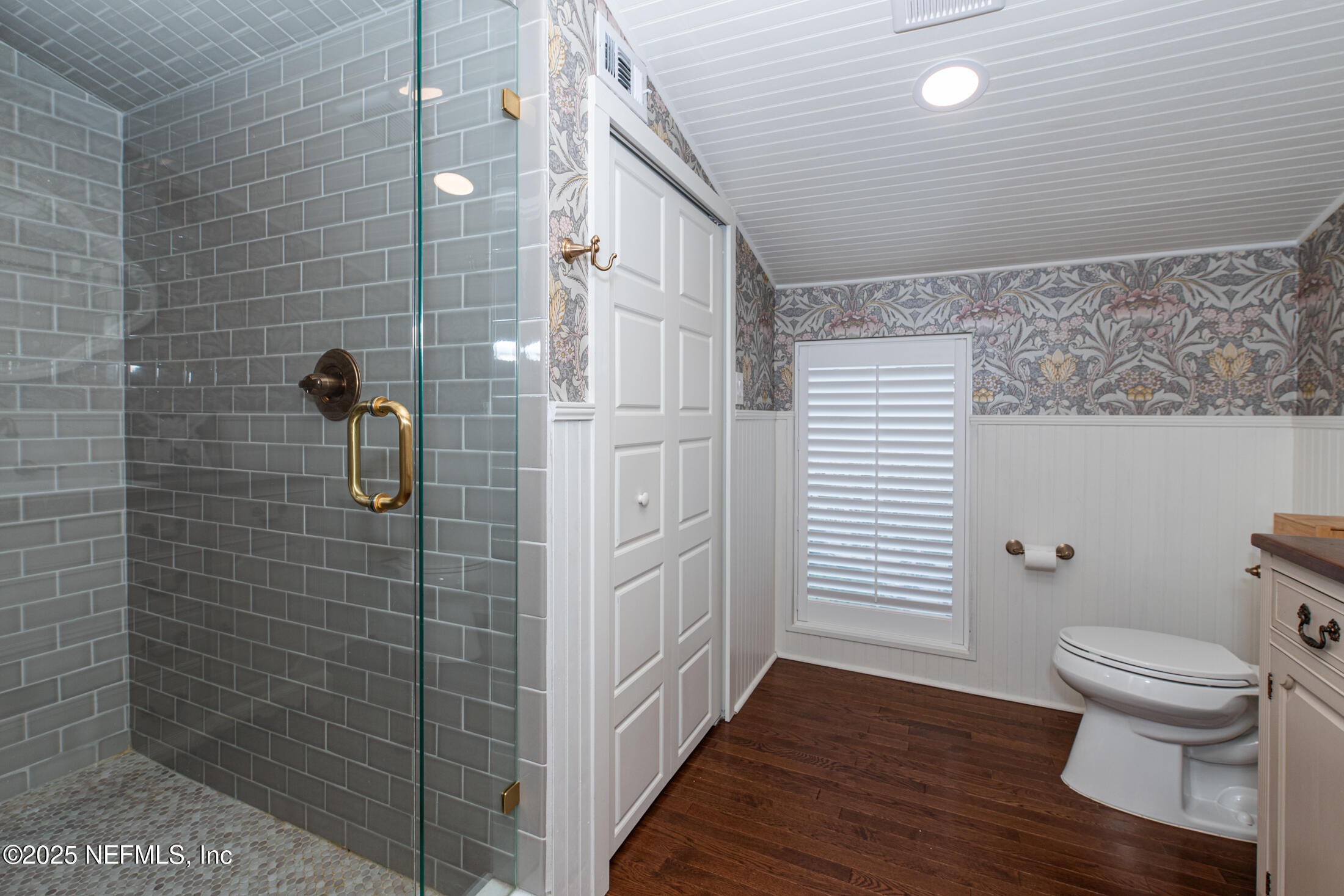 56 Water Street St. Augustine, FL 32084 - Photo 51 of 61 a bathroom with a toilet and a shower