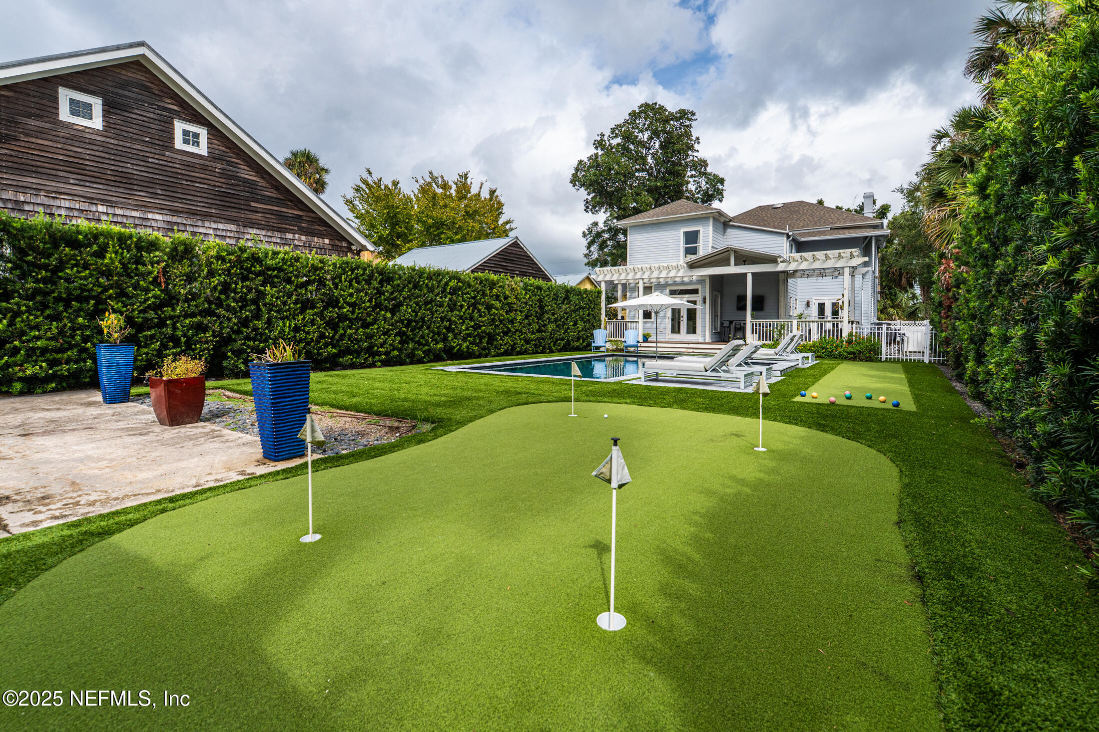 56 Water Street St. Augustine, FL 32084 - Photo 60 of 61 a front view of a house with swimming pool