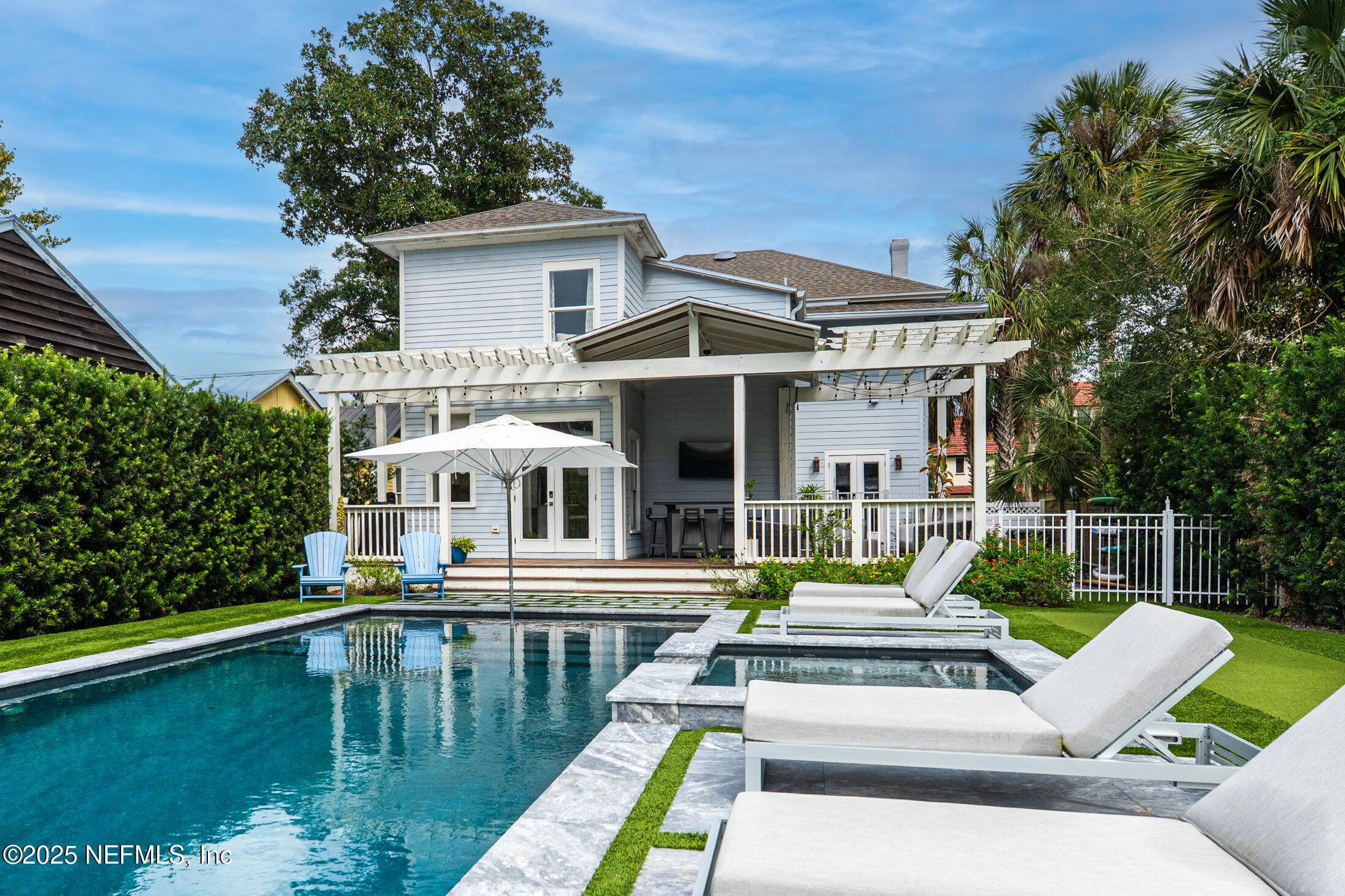 56 Water Street St. Augustine, FL 32084 - Photo 61 of 61 a view of a house with swimming pool and porch