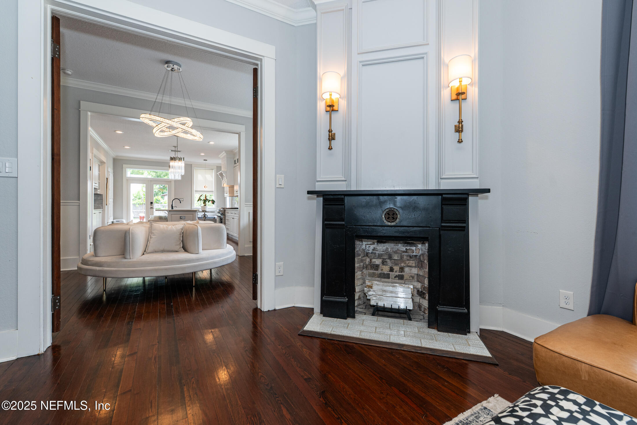 56 Water Street St. Augustine, FL 32084 - Photo 7 of 61 a living room with furniture and a fireplace