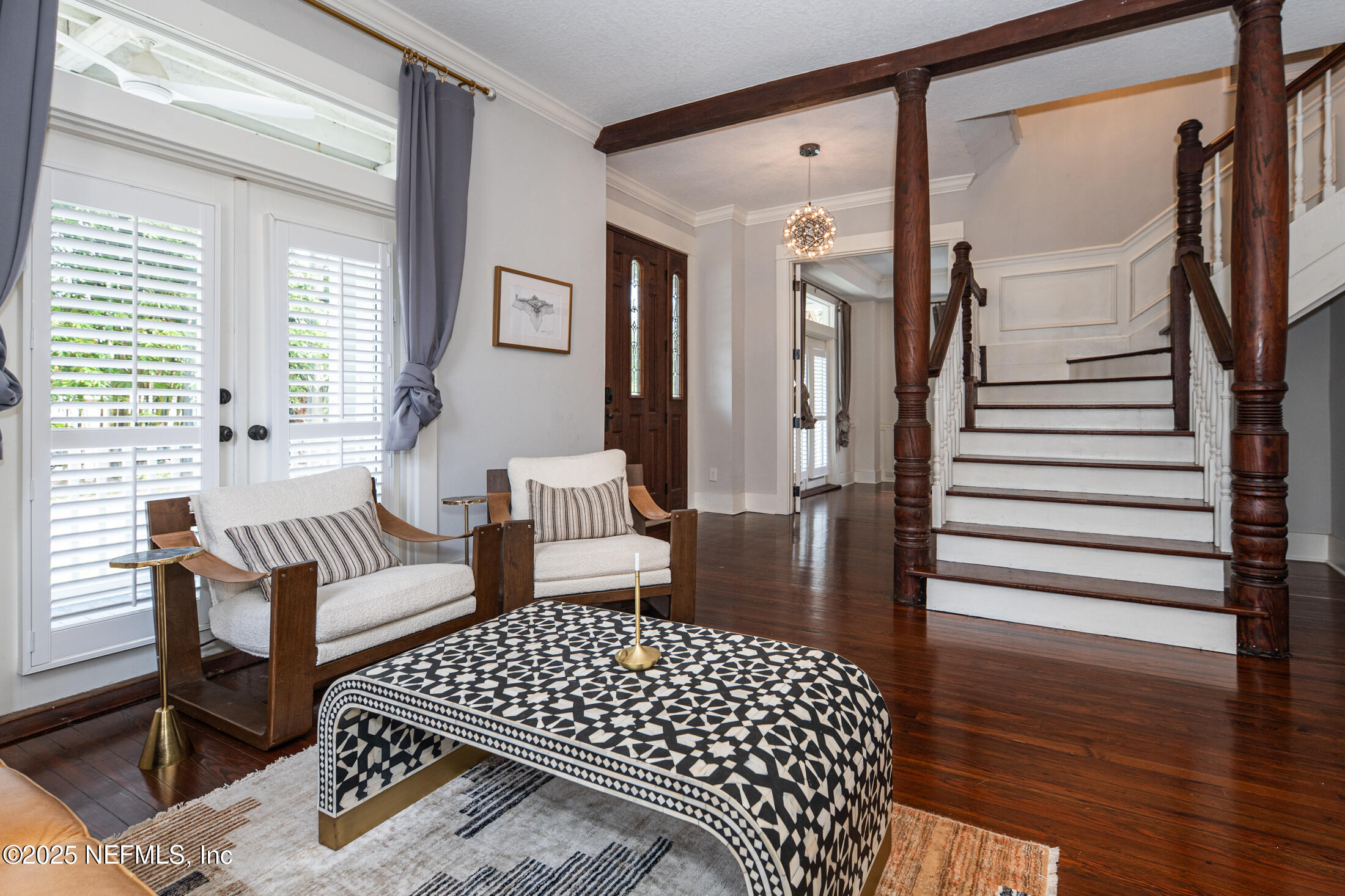 56 Water Street St. Augustine, FL 32084 - Photo 8 of 61 a bedroom with furniture and wooden floor