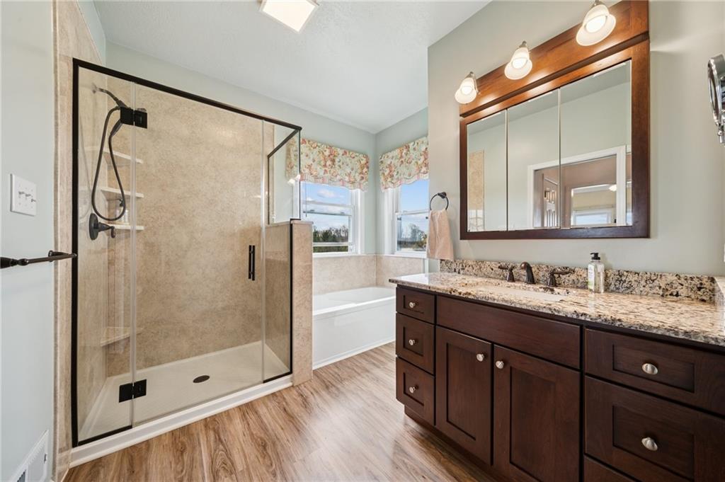 11 Stolze Road Burgettstown, PA 15021 - Photo 22 of 47 a bathroom with a double vanity sink mirror and shower