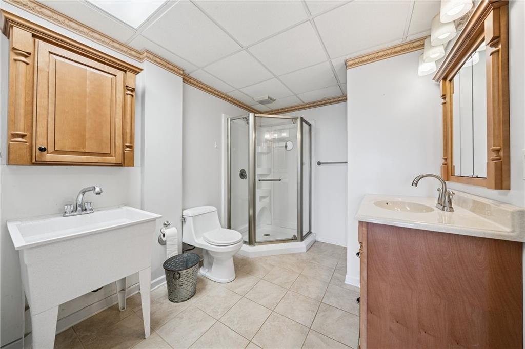 11 Stolze Road Burgettstown, PA 15021 - Photo 35 of 47 a bathroom with a toilet sink and mirror