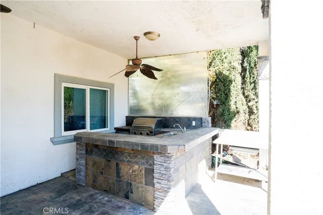 a bathroom with a sink and mirror
