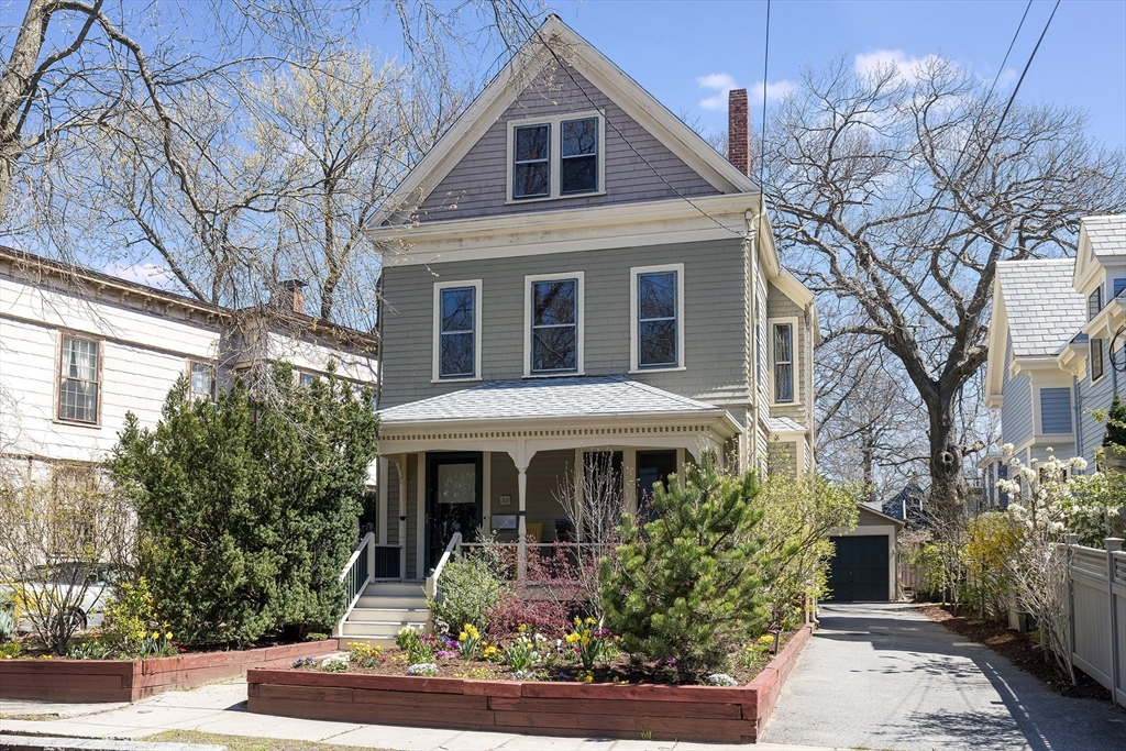 10 Howland Street Cambridge, MA 02138 - Photo 1 of 14 a front view of a house with garden
