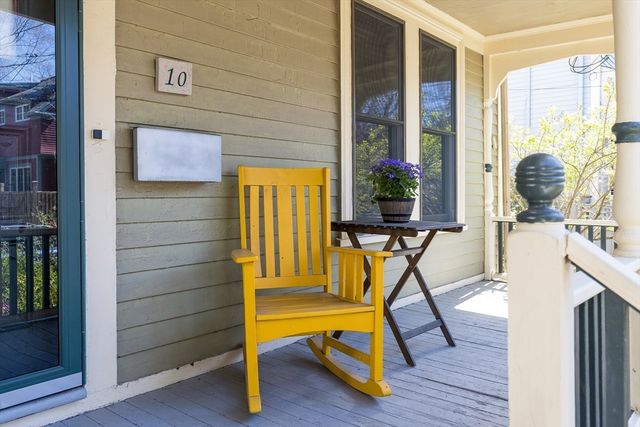 a view of a room with gym equipment and windows