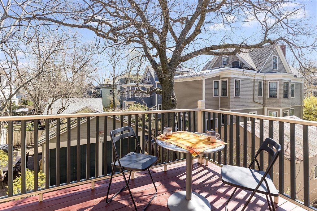 10 Howland Street Cambridge, MA 02138 - Photo 10 of 14 a view of a chairs and table in the patio