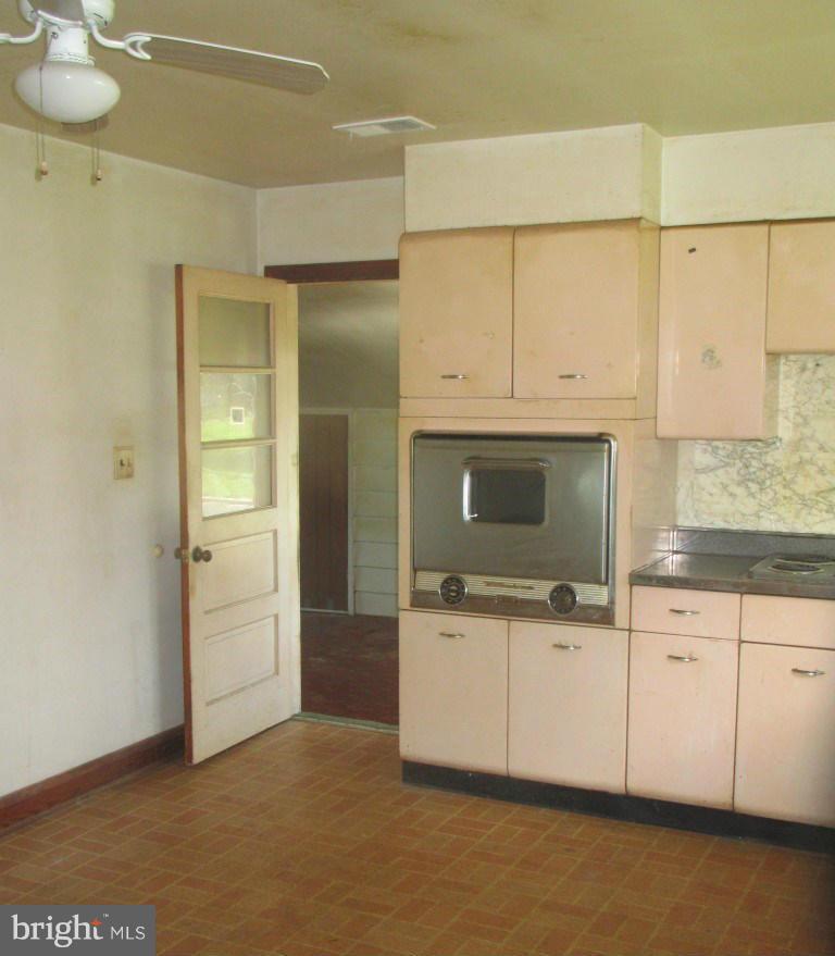 7763 Tick Neck Road Pasadena, MD 21122 - Photo 8 of 11 Kitchen