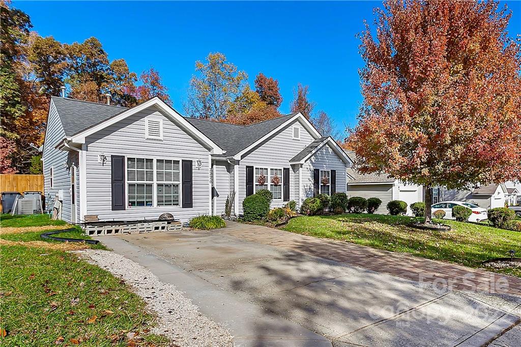 2220 Meadecroft Road Charlotte, NC 28214 - Photo 3 of 16 a front view of a house with a yard