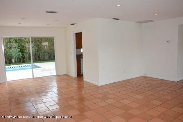 220 Puritan Road West Palm Beach, FL 33405 - Photo 6 of 10 a view of an empty room with a window