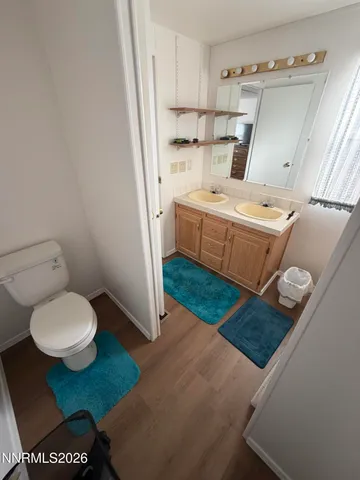 a view of a kitchen from the sink