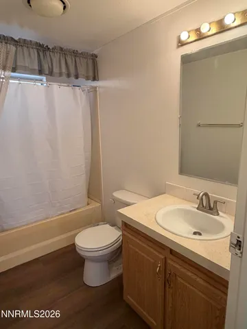 a utility room with washer and dryer