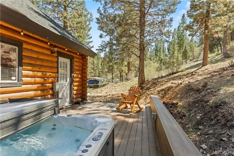 swimming pool view with a outdoor seating