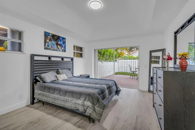 a view of empty room with white walls