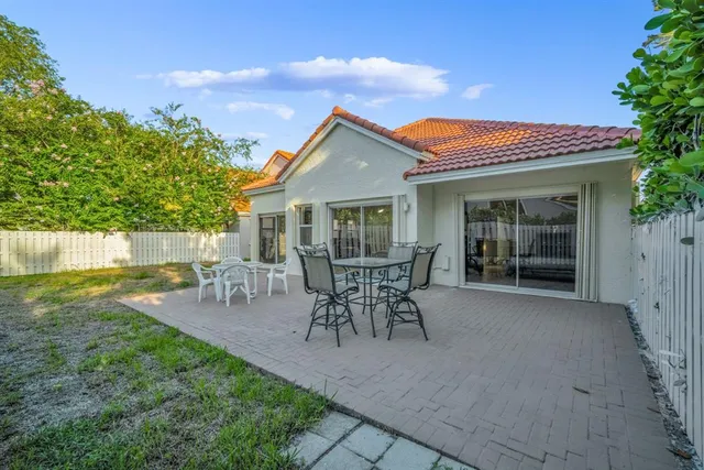 aerial view of a house with a garden