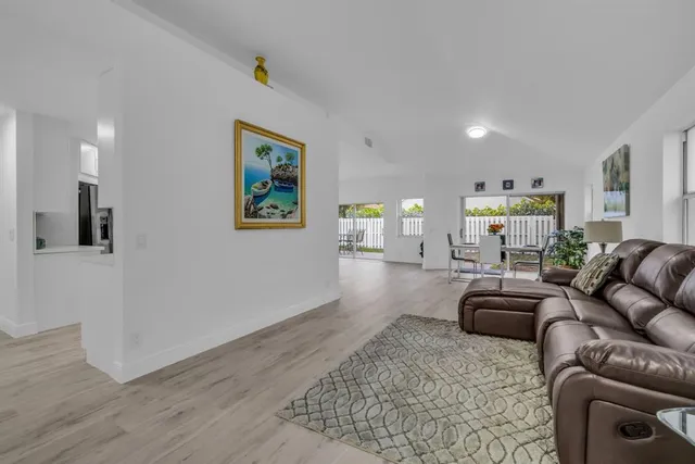 a living room with furniture and a couch