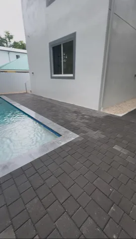 a view of an entryway with wooden floor and windows