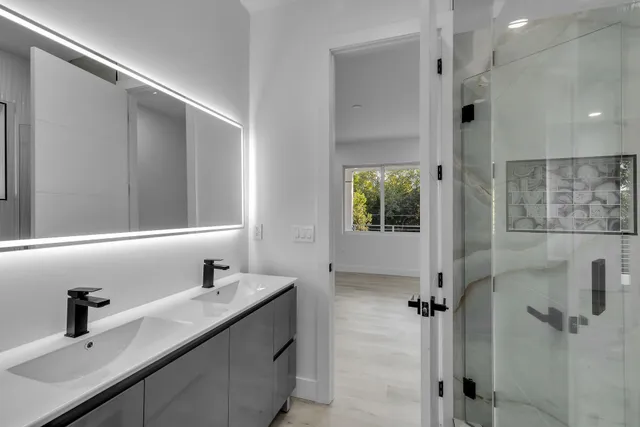 a bathroom with a sink and a mirror