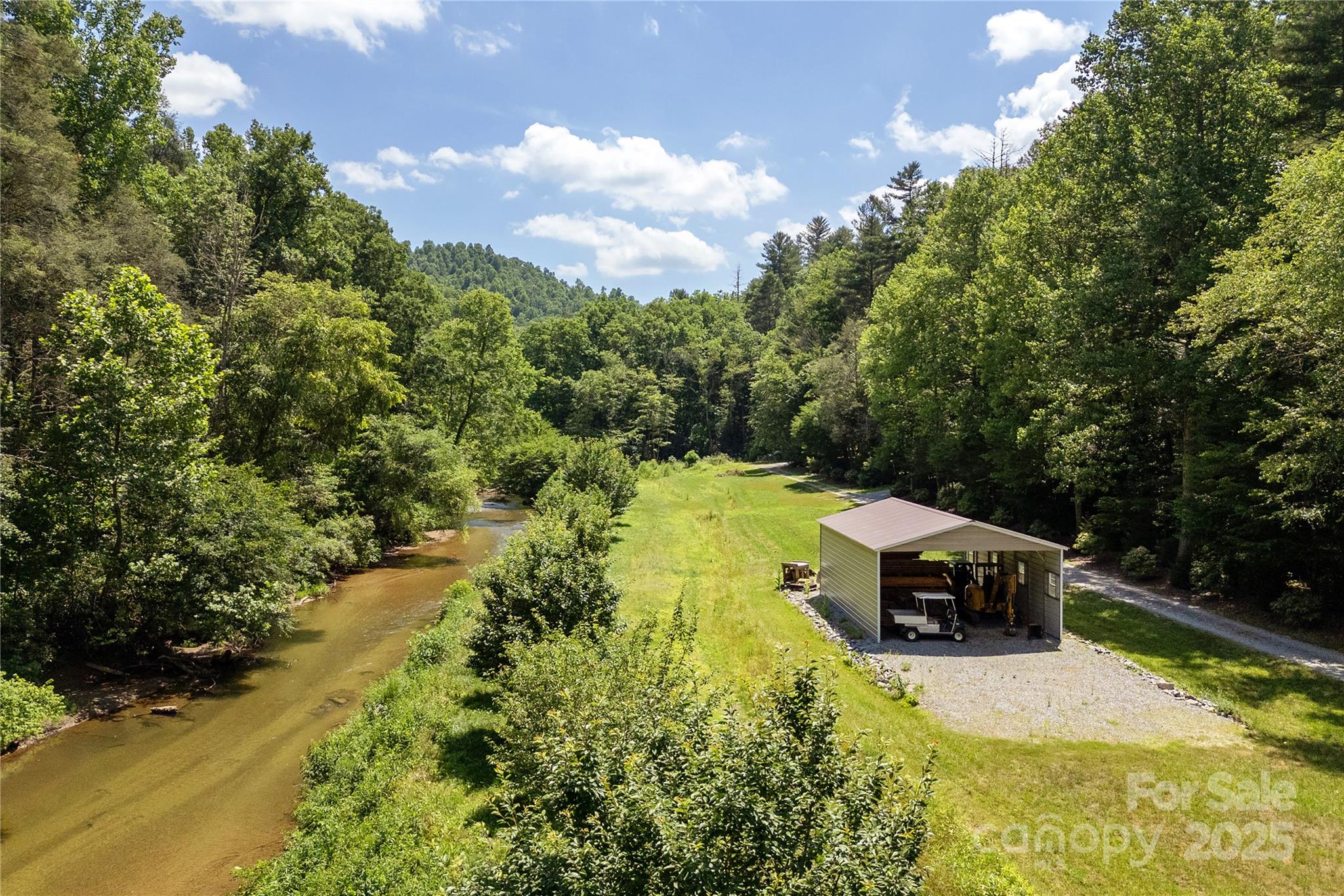 458 Rio Verde Drive Zirconia, NC 28790 - Photo 22 of 34 a view of a house with a yard