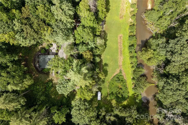 a view of a mountain with mountains in the background
