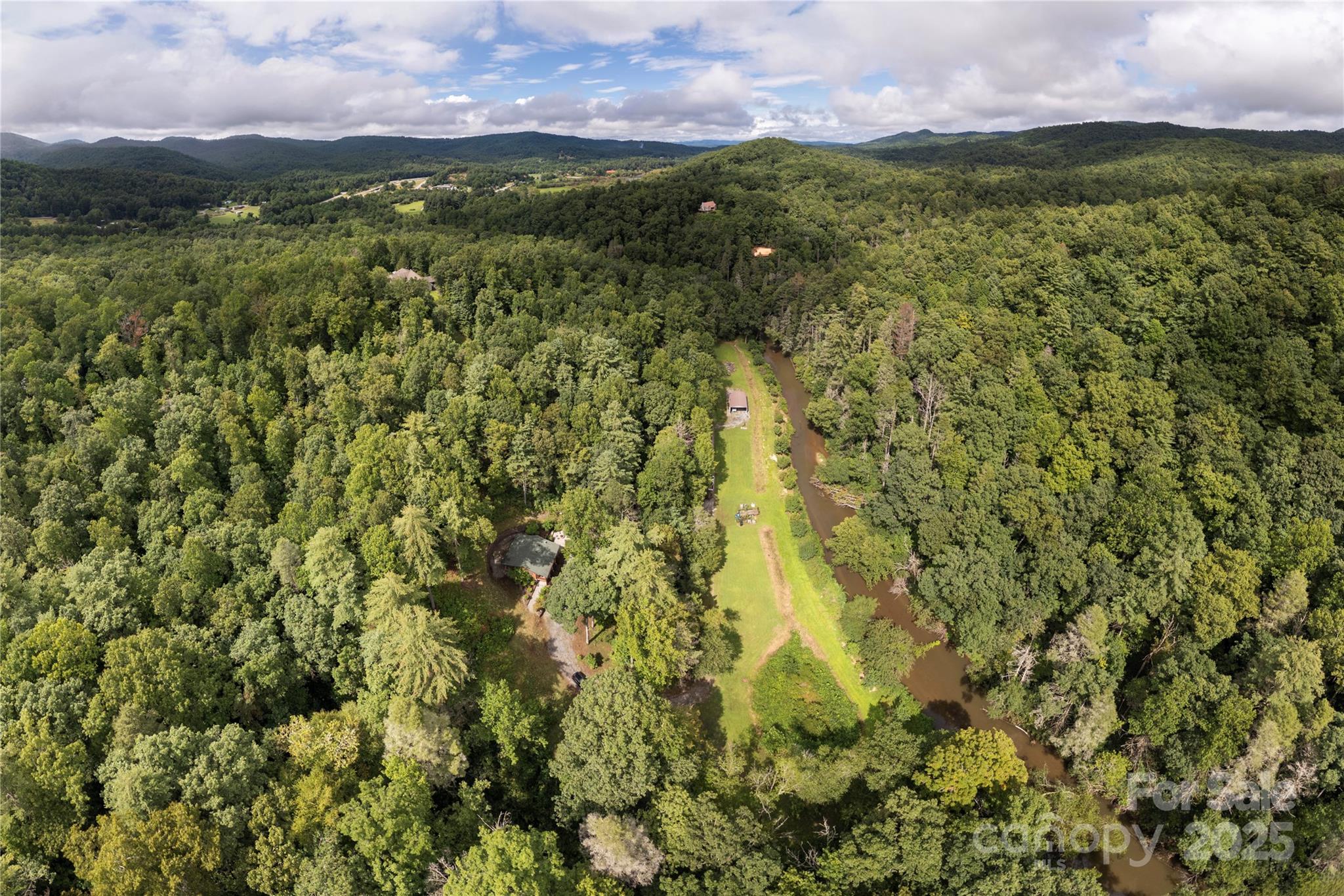 458 Rio Verde Drive Zirconia, NC 28790 - Photo 27 of 34 a view of a yard with an outdoor space