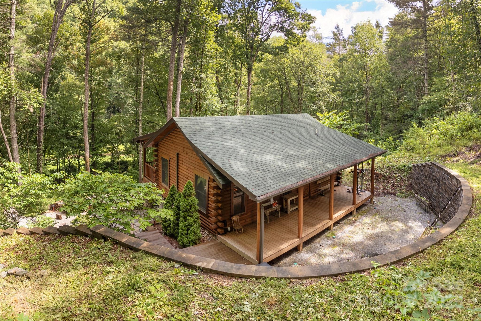 458 Rio Verde Drive Zirconia, NC 28790 - Photo 4 of 34 front view of a house with a yard
