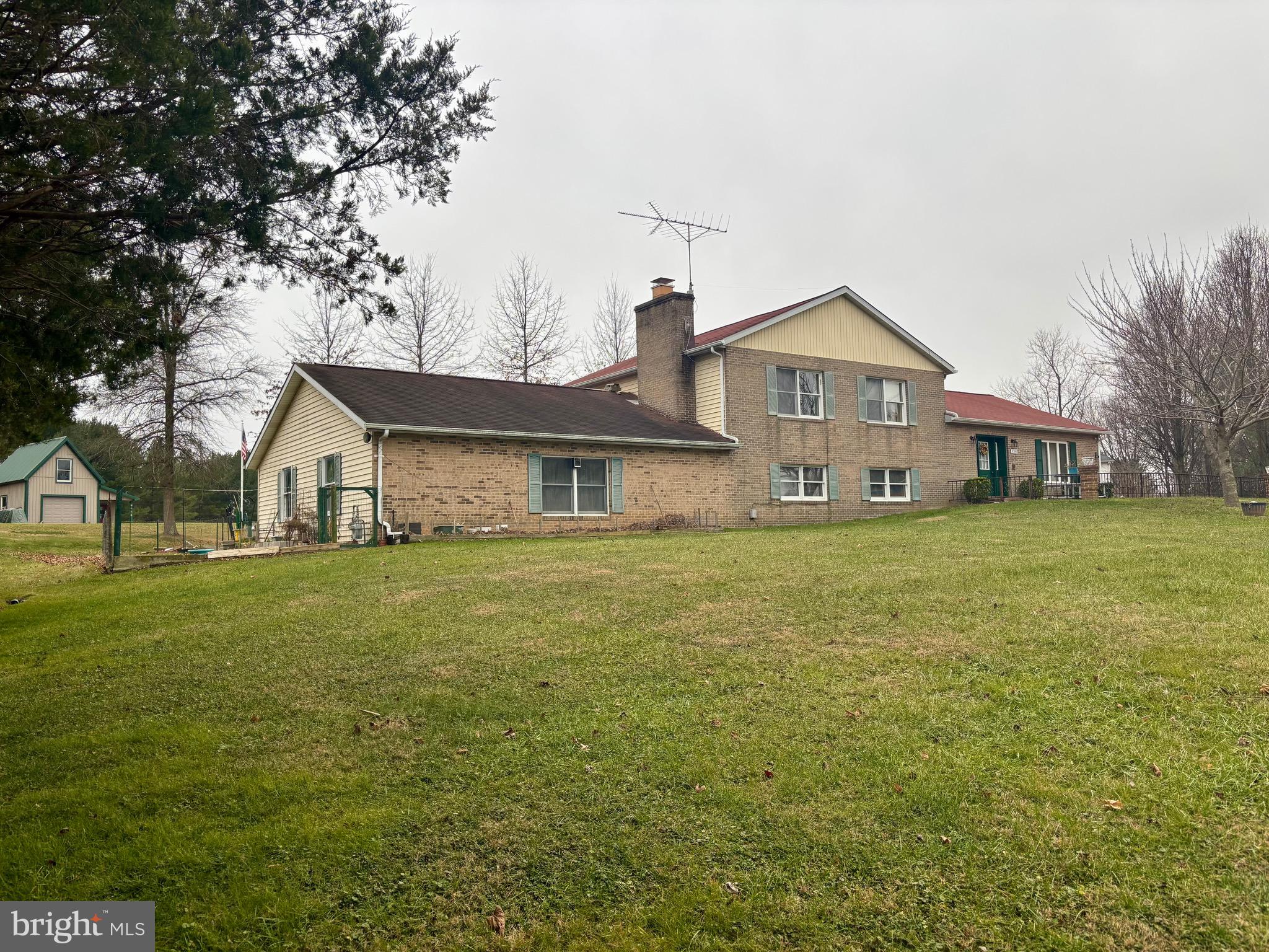 1201 Uniontown Road Westminster, MD 21158 - Photo 6 of 7 a front view of house with yard and green space
