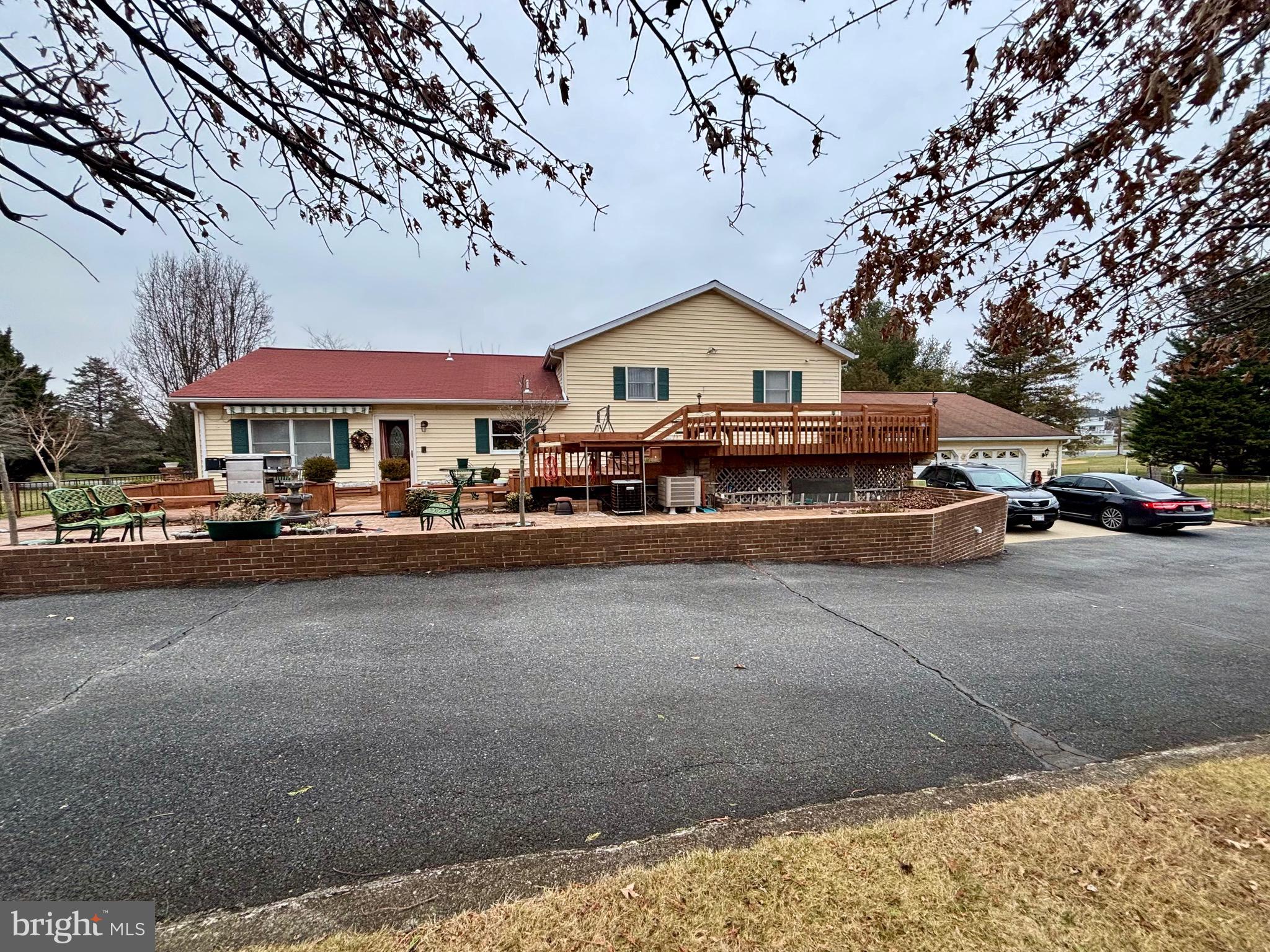 1201 Uniontown Road Westminster, MD 21158 - Photo 7 of 7 a car parked in front of the house