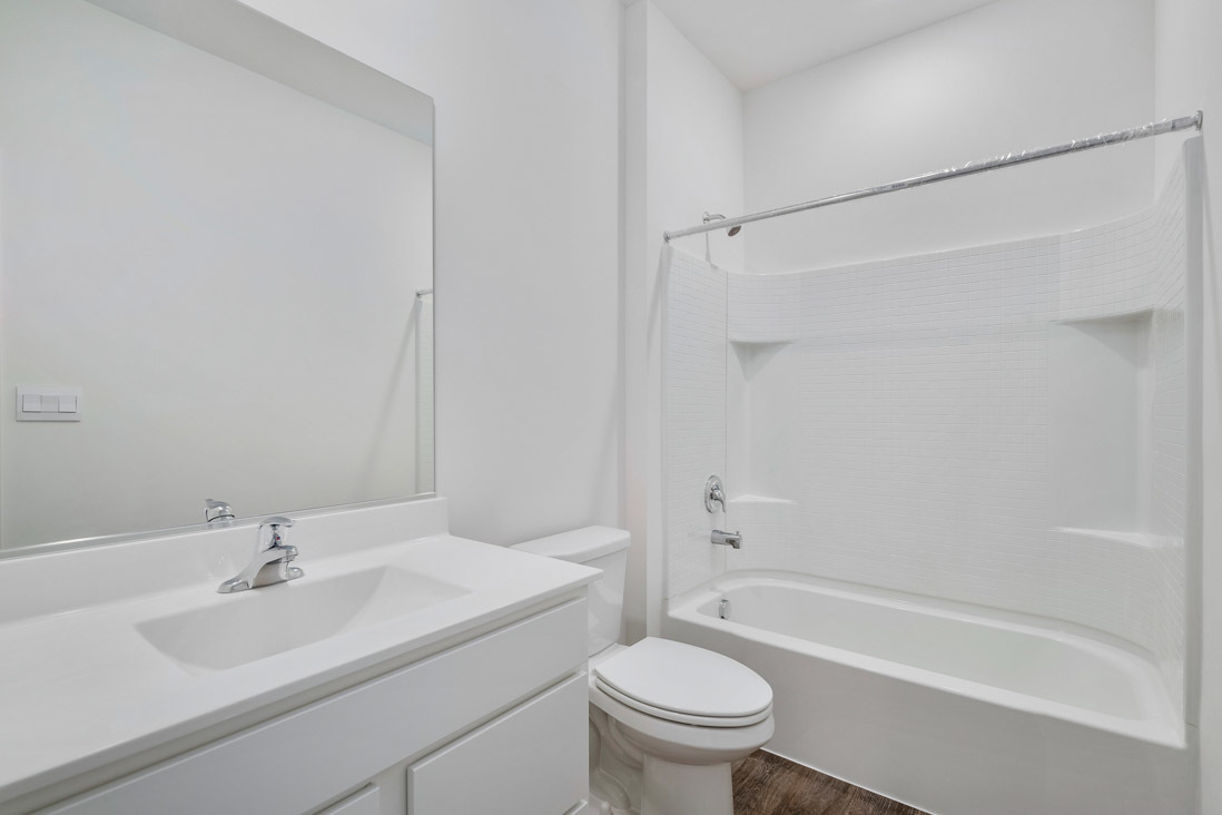 283 Ridley Street North Aurora, IL 60542 - Photo 11 of 40 a bathroom with a sink toilet and shower