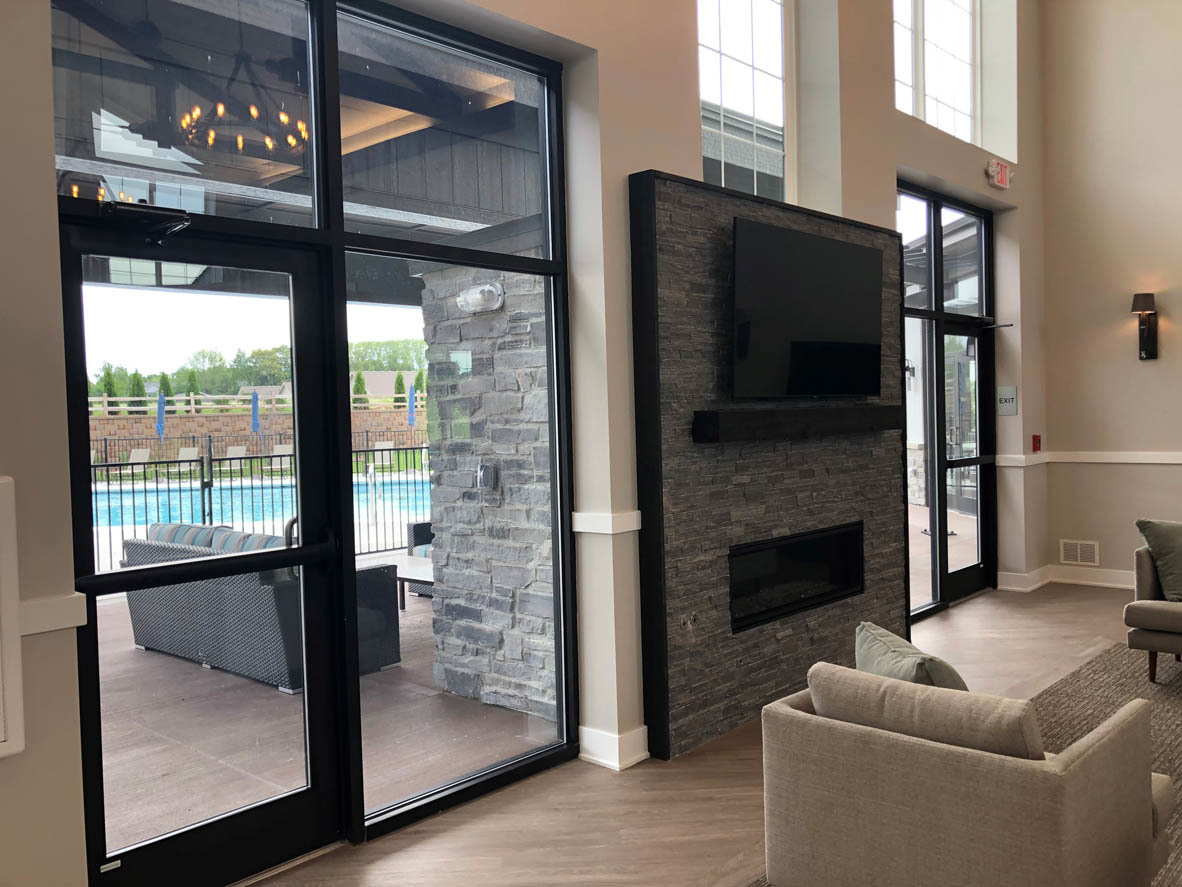 283 Ridley Street North Aurora, IL 60542 - Photo 19 of 40 a living room with furniture and a fireplace