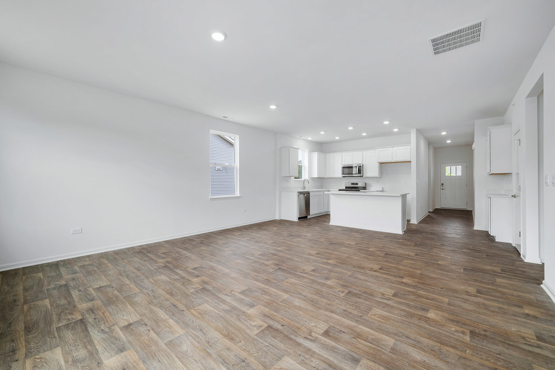 283 Ridley Street North Aurora, IL 60542 - Photo 9 of 40 a view of kitchen with wooden floor and kitchen appliances