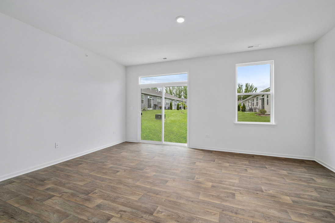 283 Ridley Street North Aurora, IL 60542 - Photo 10 of 40 a view of an empty room with a window