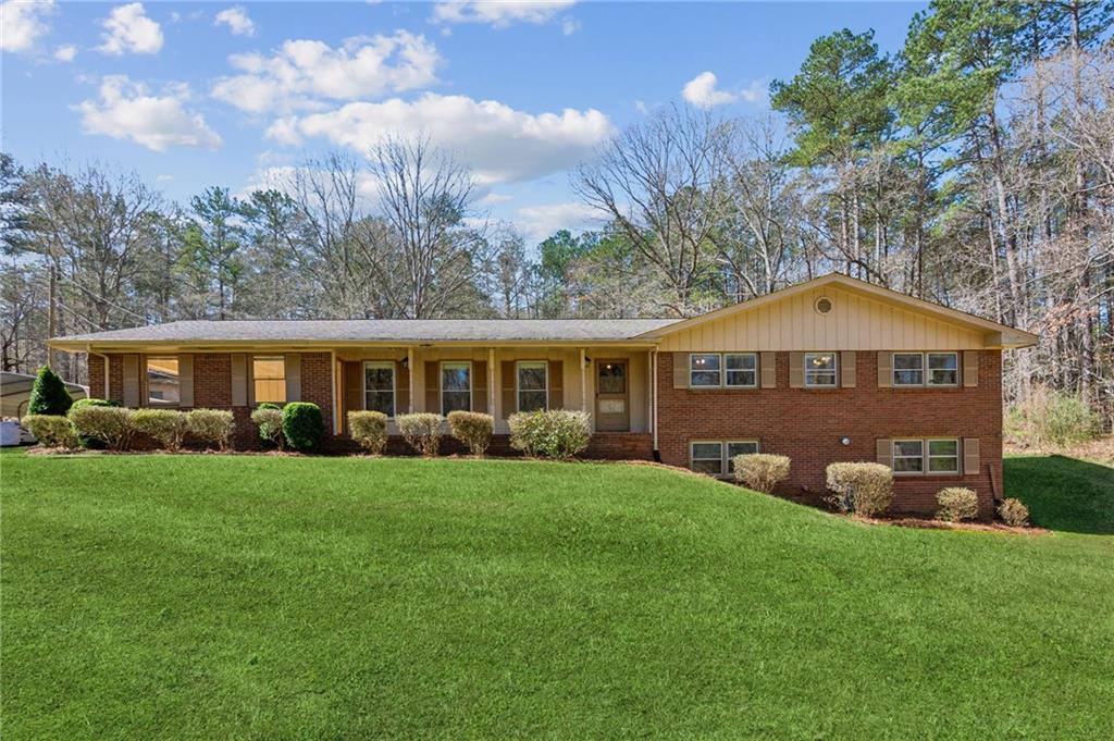 527 Mays Road Stockbridge, GA 30281 - Photo 1 of 1 a front view of a house with a yard